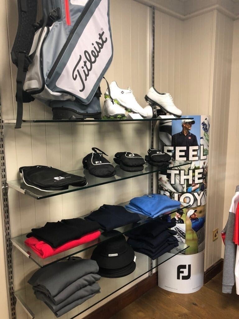 Shelf of golf products
