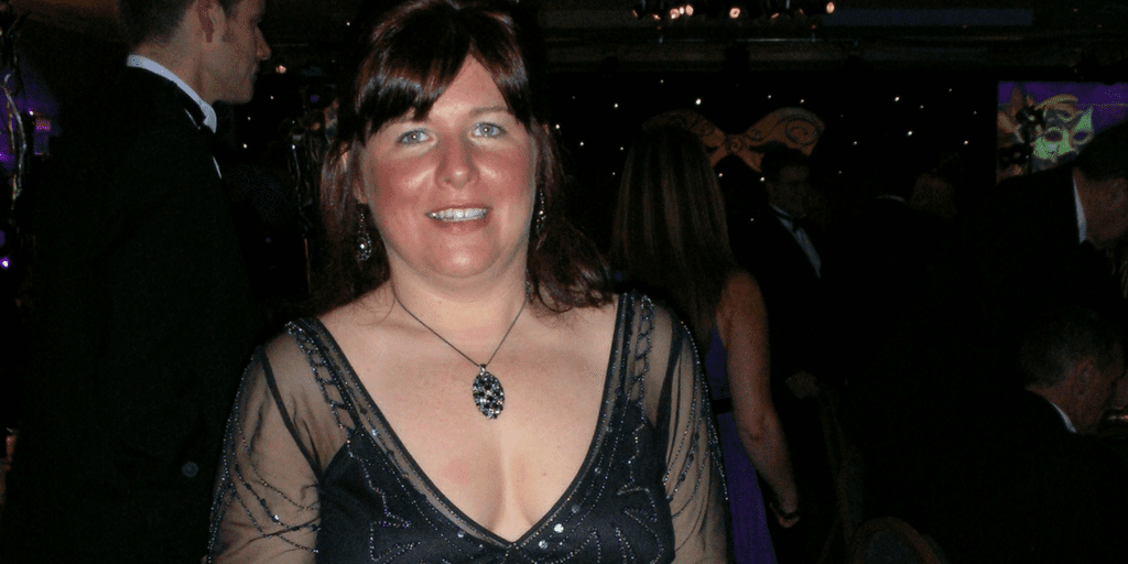 Emma Pridding in a black dress at a party 