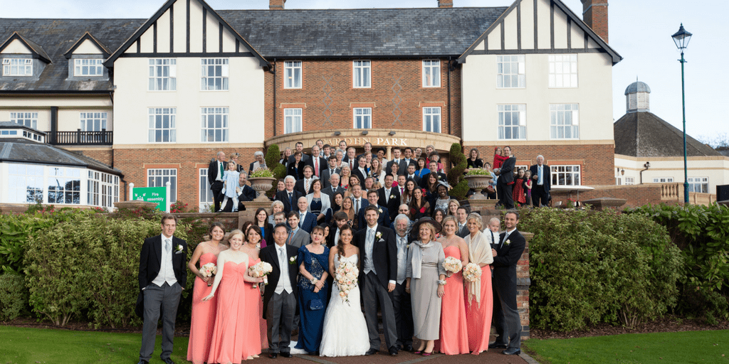 Wedding guests in front of Carden Park